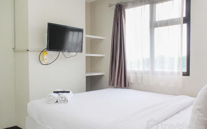 Comfortable Cozy Living 2BR at Lagoon By Travelio