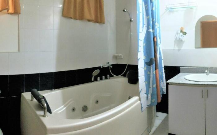 One (1) bedroom condo unit with common pool