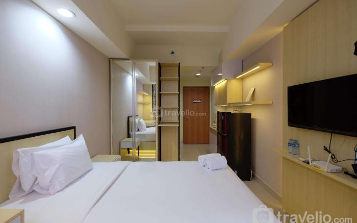 Minimalist Studio at Evenciio Margonda By Travelio
