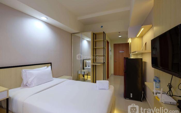 Minimalist Studio at Evenciio Margonda By Travelio