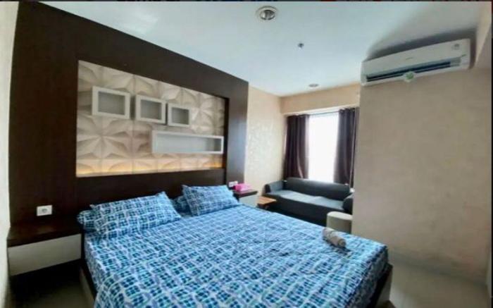 Apartemen Grand Kamala Lagoon by Happy Room's
