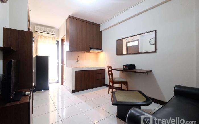 Comfort 2BR at Lagoon Apartment By Travelio
