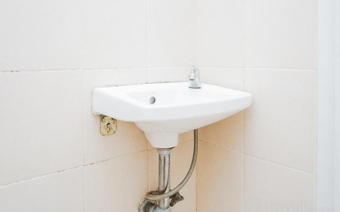 Homey Studio at Green Palm Residence By Travelio