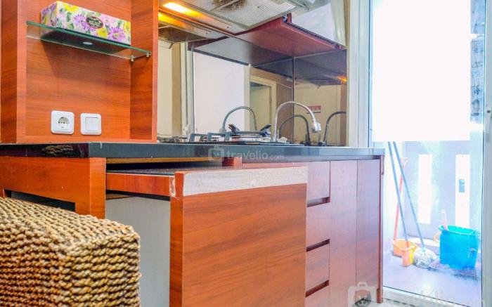 Comfy 2BR Green Pramuka City Apartment By Travelio