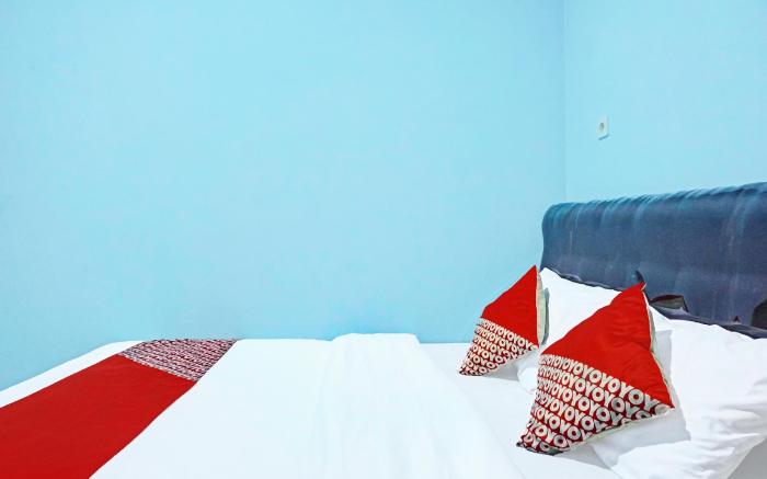 Super OYO 91535 J&b Rooms Tomang