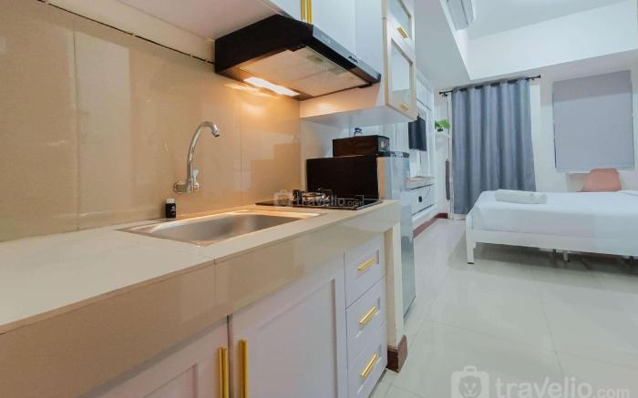 WhiteCozy Studio at Vida View Makassar By Travelio