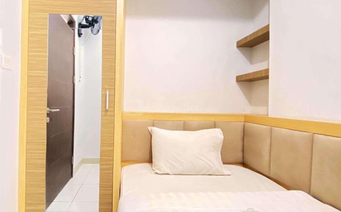 Homey Cozy 2BR at Mekarwangi Square By Travelio