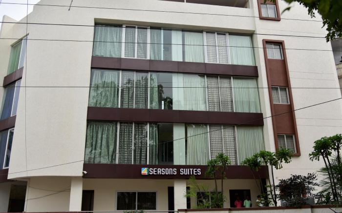 SEASONS SUITES 