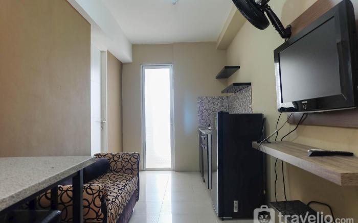 Strategic 1BR Bassura City Apartment By Travelio