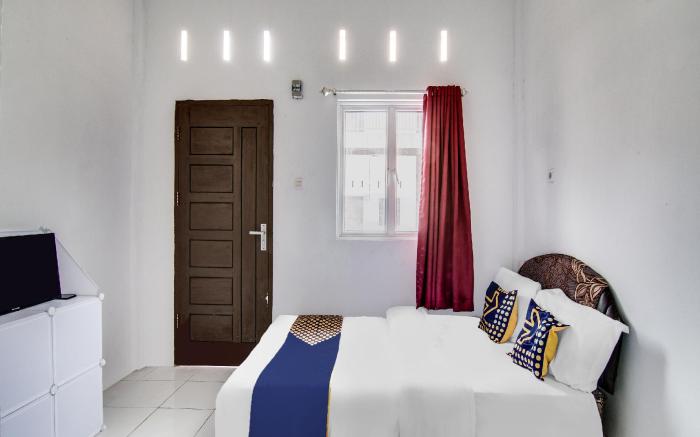 SPOT ON 91858 Raja Homestay Syariah