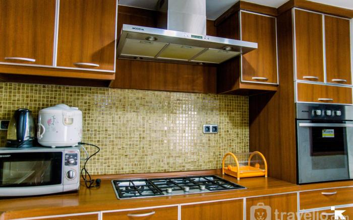 Elegant 2BR Sudirman Tower Condominium By Travelio