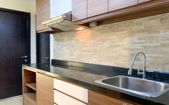 Warm Homey 1BR Belmont Residence Puri By Travelio