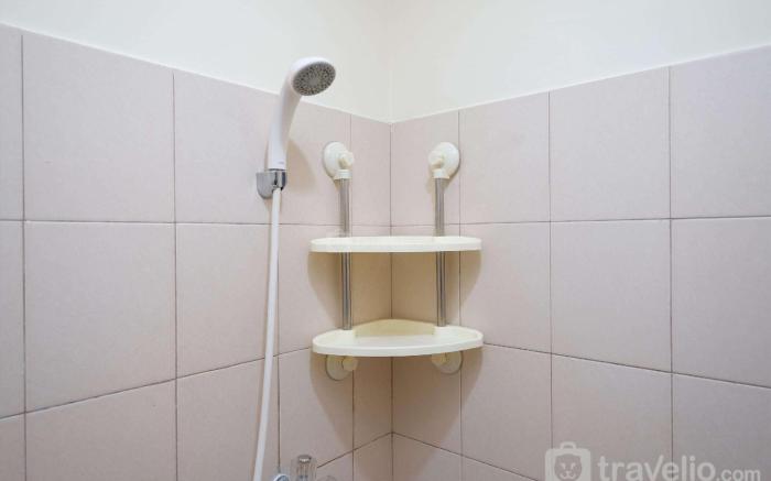 Homey and Cozy Living Studio Tifolia By Travelio