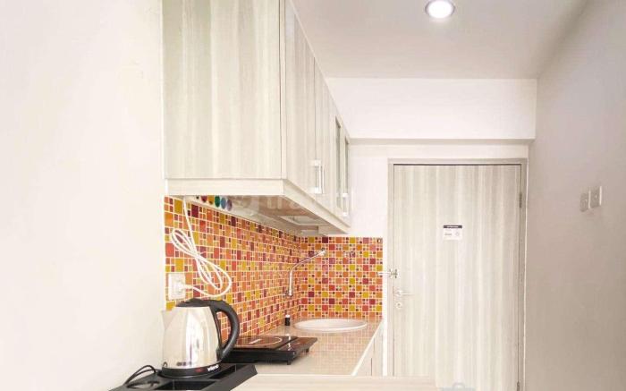 Modest 2BR at Jarrdin Cihampelas Apt By Travelio