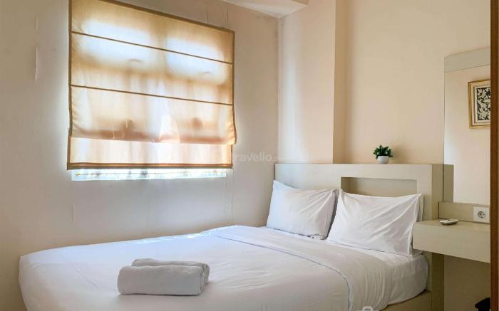 Modern Comfort 2BR Green Pramuka City By Travelio
