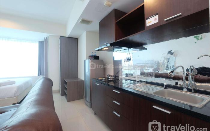 Minimalist Studio Grand Kamala Lagoon By Travelio