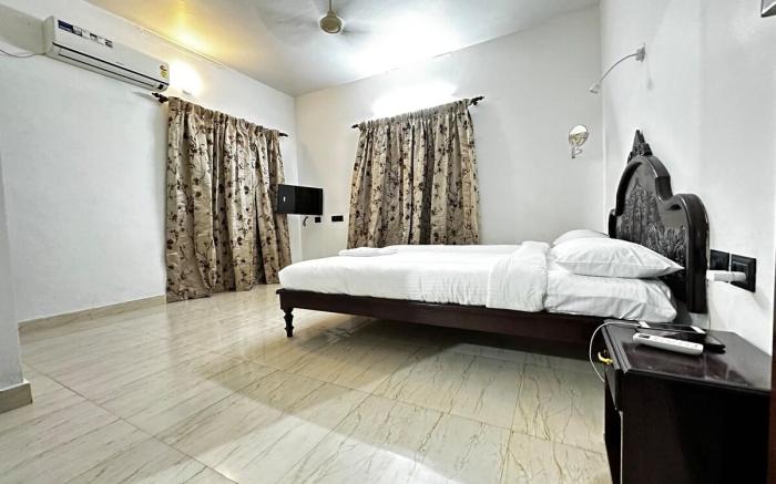 Kovalam Beach house - room102