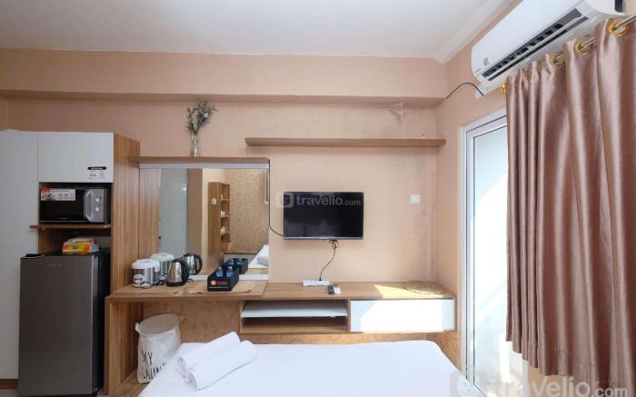 Fancy Studio at Green Pramuka City By Travelio