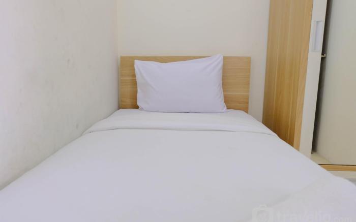 Cozy and Homey 2BR Tamansari Panoramic By Travelio