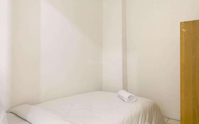 Cozy 2BR at Delta Cakung Apartment By Travelio