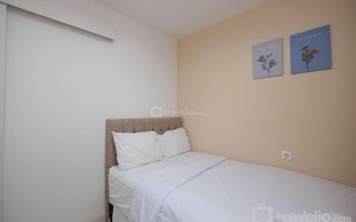 Comfort and Homey 2BR at Sentul Tower By Travelio