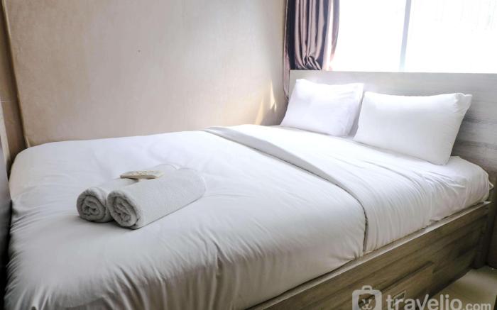 Homey and Cozy 2BR Jarrdin Cihampelas By Travelio