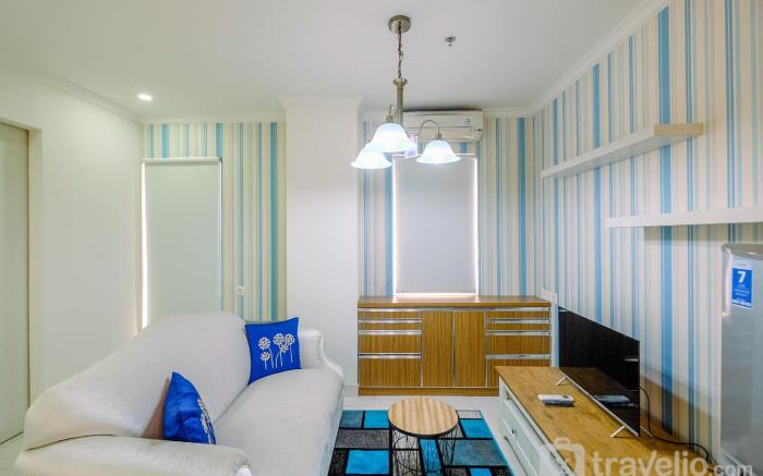 Enjoy Living 2BR at Sentul Tower By Travelio
