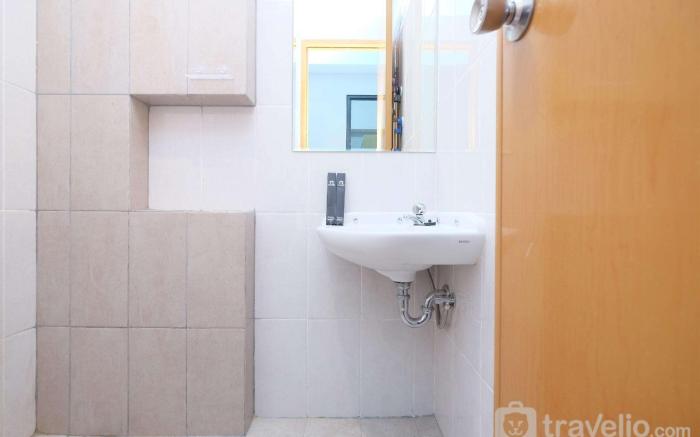 Comfort and Modern 2BR Royal Heights By Travelio
