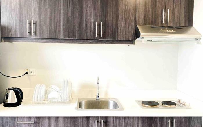 Two-Bedroom Gilmore Tower near Robinsons Magnolia