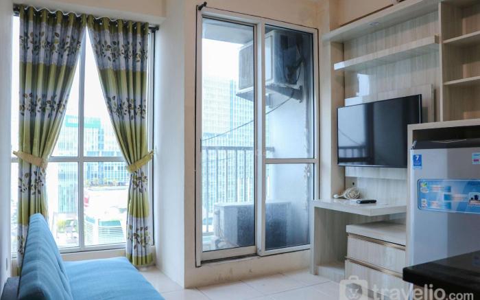 Functional 2BR at Tifolia Apt By Travelio