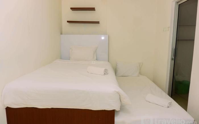 Comfort and Cozy 1BR at Teluk Intan By Travelio