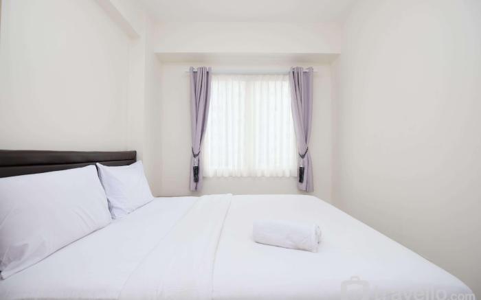 Comfort 2BR at Podomoro Golf View By Travelio