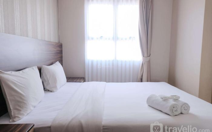 Homey 2BR Mekarwangi Square By Travelio