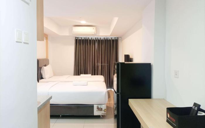 Homey Studio at De Prima Apartment By Travelio