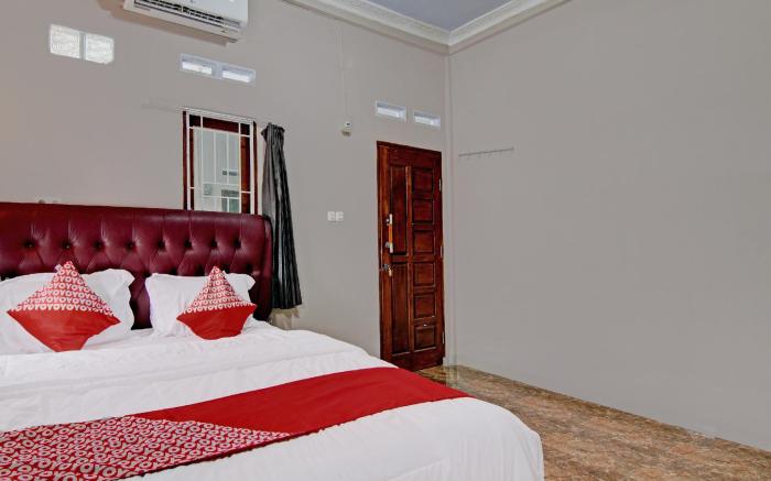 OYO 92456 Putri Homestay Syariah Near SPBU 14.282.694 (Air Hitam)
