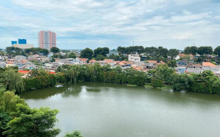 Basic 2BR at Lagoon Apartment By Travelio