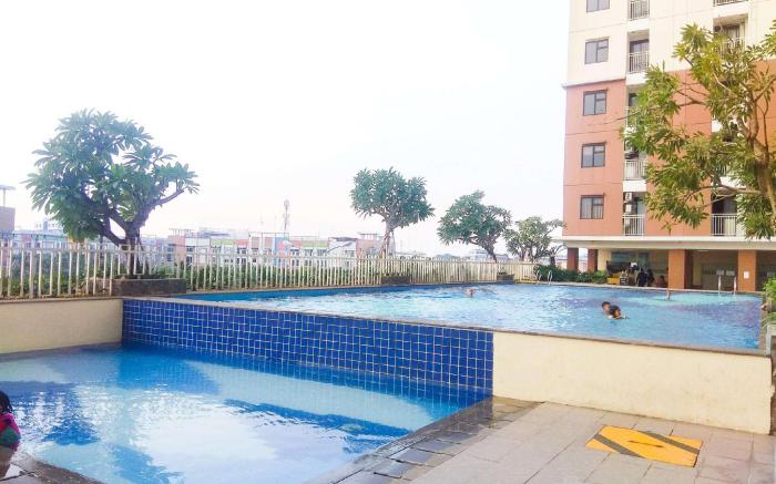 Basic 2BR at Lagoon Apartment By Travelio