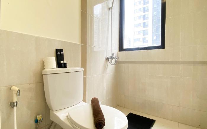 Cozy Living 2BR at Meikarta Apartment By Travelio