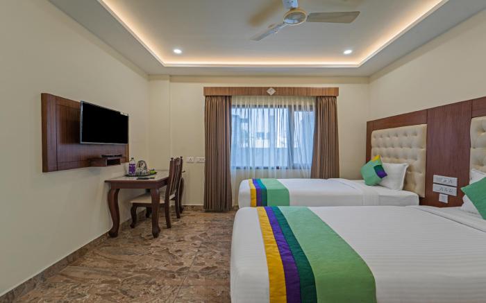 Treebo Aaravi Residency, 800 Mtrs From Promenade Beach