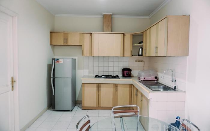 Elegant Comfortable 2BR Puri Garden By Travelio