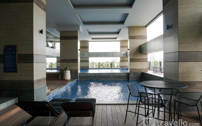 Spacious 2BR Loft Apt Maqna Residence By Travelio