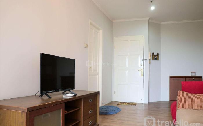 Cozy Living and Modern 2BR Puri Garden By Travelio