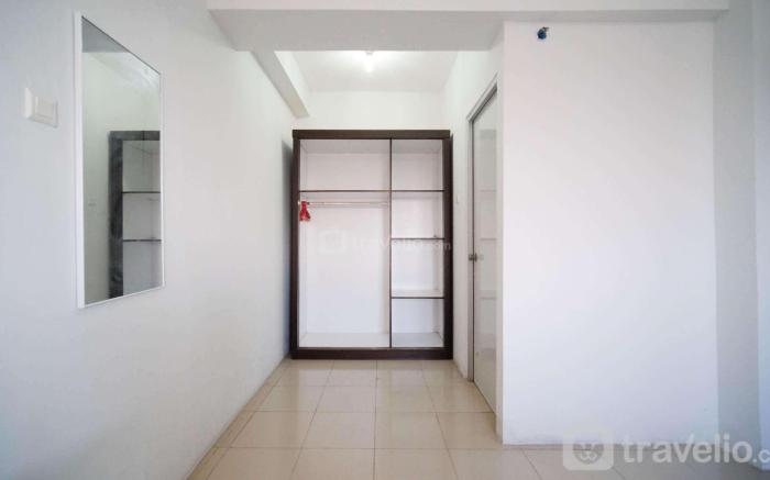 Simple 2BR Extra Bed at Menara Rungkut By Travelio