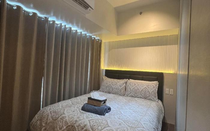 E & T Homecation 2 Bedroom at SMDC AIR Residences