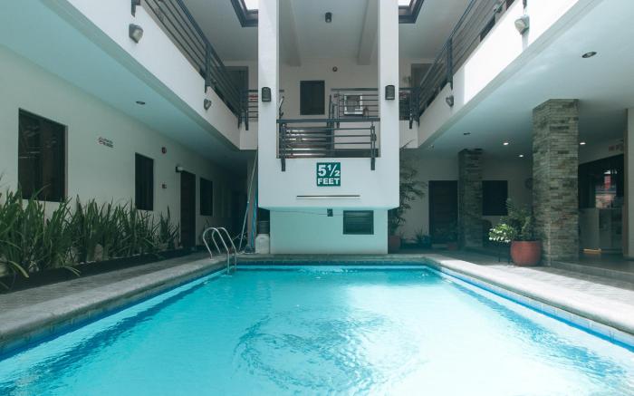 Elyseah Condotel by RedDoorz