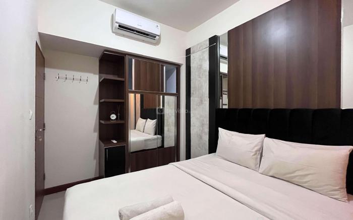 Warm & Cozy 2BR Vida View Makassar Apt By Travelio