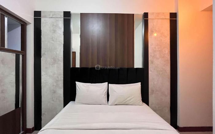Warm & Cozy 2BR Vida View Makassar Apt By Travelio