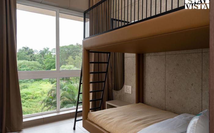 StayVista's Rosso with Outdoor Pool, Theatre-Disc Room & Games Room