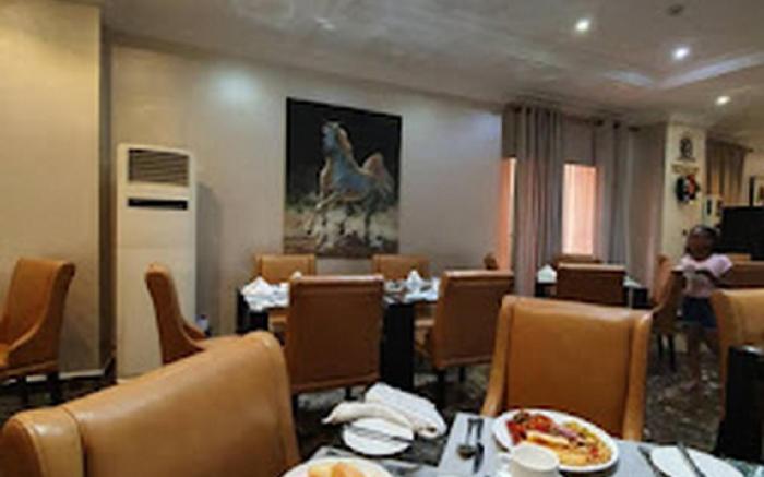 THE WELLS CARLTON HOTEL AND APARTMENTS