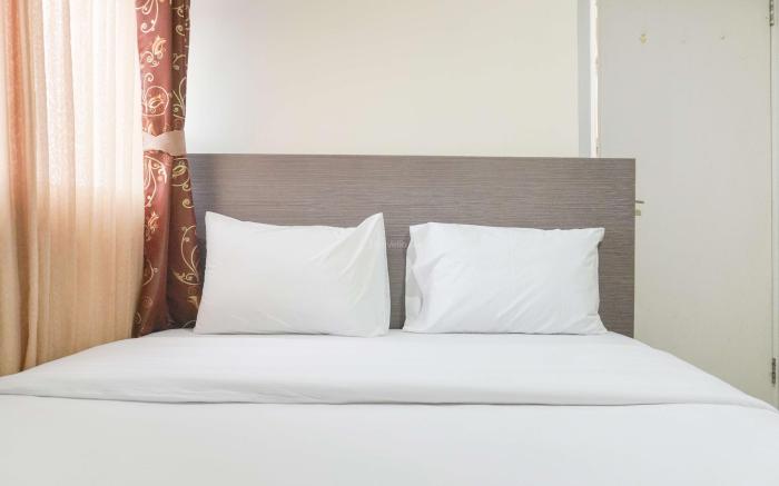 Good Relax 2BR Green Pramuka City Apt By Travelio